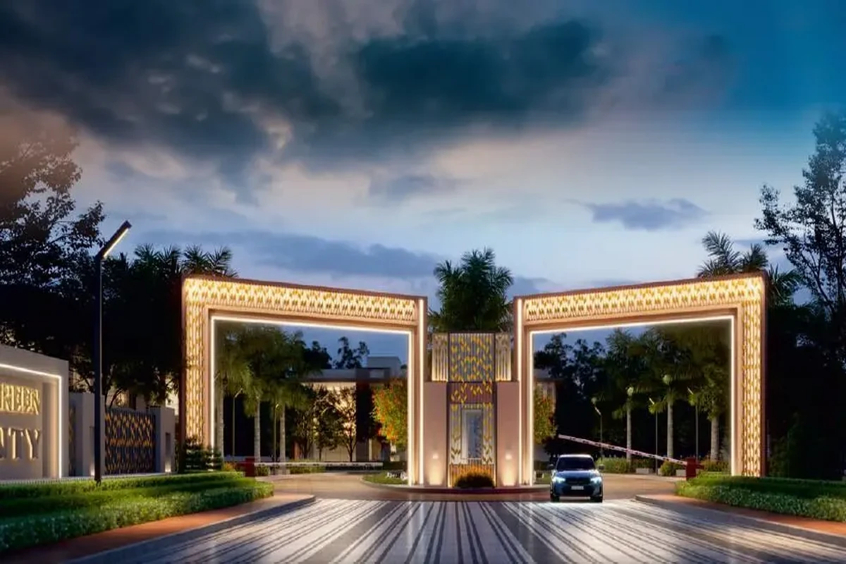 Royal Green County illuminated entrance gate with arch lighting at night in Kundli Sonipat